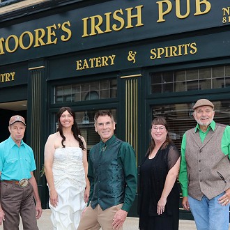 A special “Thank You” to Ken Pannier Photography for the publicity photo for “A Wee Bit Irish,” and to Moore’s Irish Pub of Manitowoc, WI for allowing us to use their business facade for the poster.