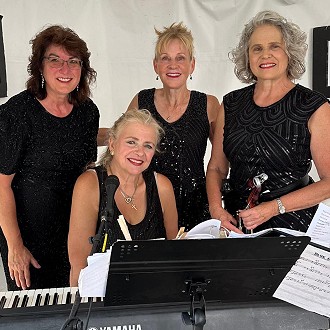The Gypsy Swing Chicks revel in the catchy music of George Gershwin and Django Reinhardt with wild ethnic music added to the mix. Featuring violin, mandolin-dobro, accordion, and upright bass to ignite an engaging time for all.