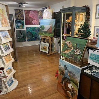 Robert Burkhard at Village Art and Created Goods. Local artists working in watercolor, photography, woodworking, paintings, etc.